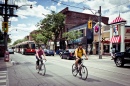 Radfahrer auf der Queen St, Toronto