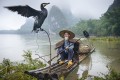 Kormoran Fischer und sein Vogel