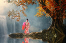 Kimono-Mädchen am Wasserfall