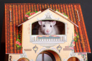 Maus in einem Puppenhaus