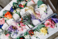 Boutonnieres aus Blumen und Moos