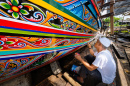 Malerei auf einem thailändischen Longtail-Boot