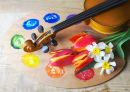 Violine, Palette und Blumen