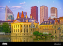 the-hagues-binnenhof-and-skyscrapers-in-background-in-the-netherlands-at-dusk-2APK11M (1)